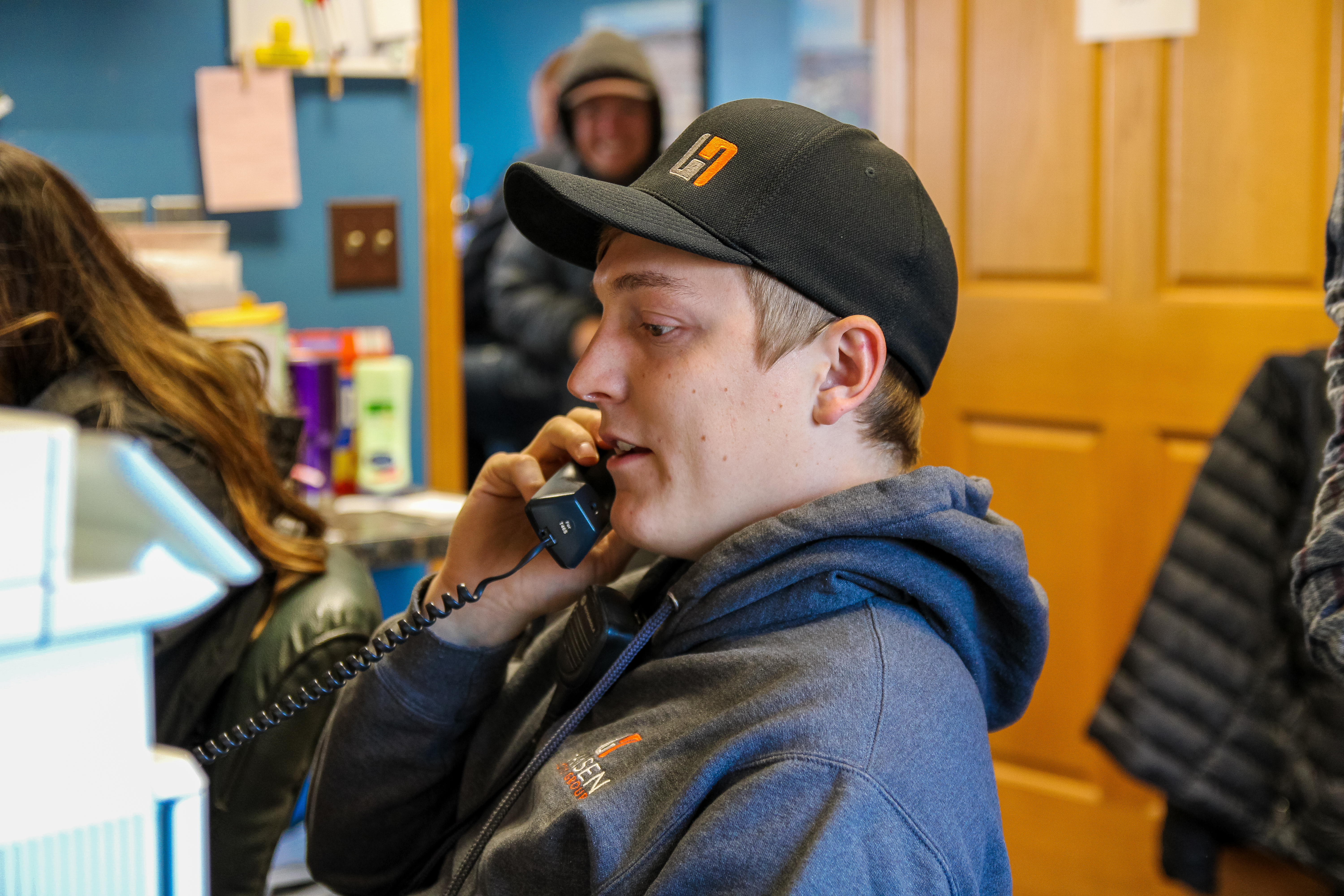 Young man answering phone