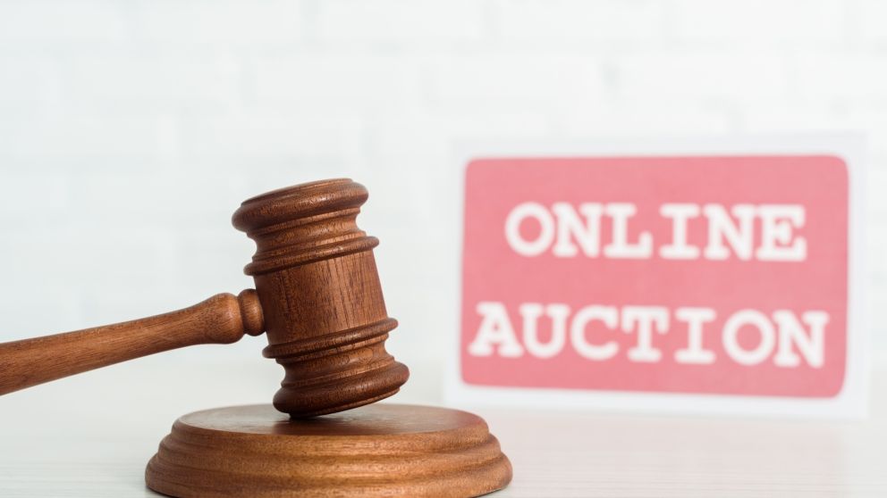 Selective-focus-of-gavel-and-card-with-online-auct-2024-11-08-05-38-23-utc