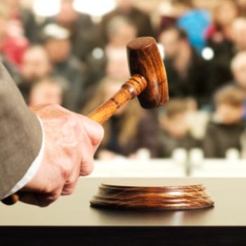 Bidders participating in live auctions in Tomball, TX